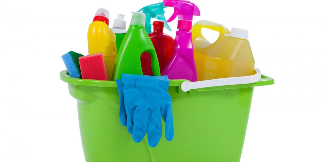 Various household cleaning supplies in a bucket The Right Cleaner